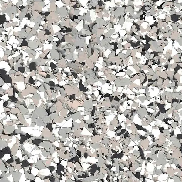 A textured surface with scattered, irregularly shaped flecks in shades of gray, white, and beige. The design creates a speckled, abstract appearance.