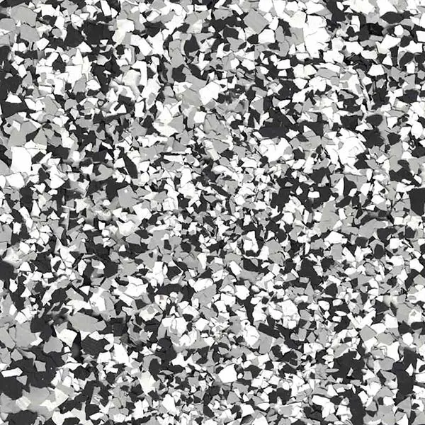 Abstract pattern of scattered black, white, and gray shapes resembling a terrazzo texture. There are no identifiable landmarks or people present.