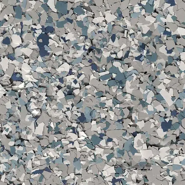 An abstract pattern of scattered, irregular-shaped pieces in shades of gray and blue, creating a textured, mosaic-like appearance. No recognizable landmarks.