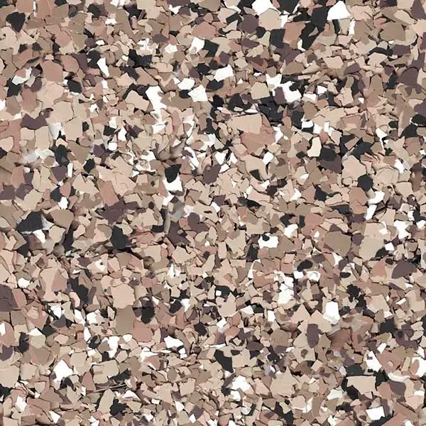 The image shows a speckled surface with an abstract pattern of beige, black, and white fragments, resembling a camouflaged design.