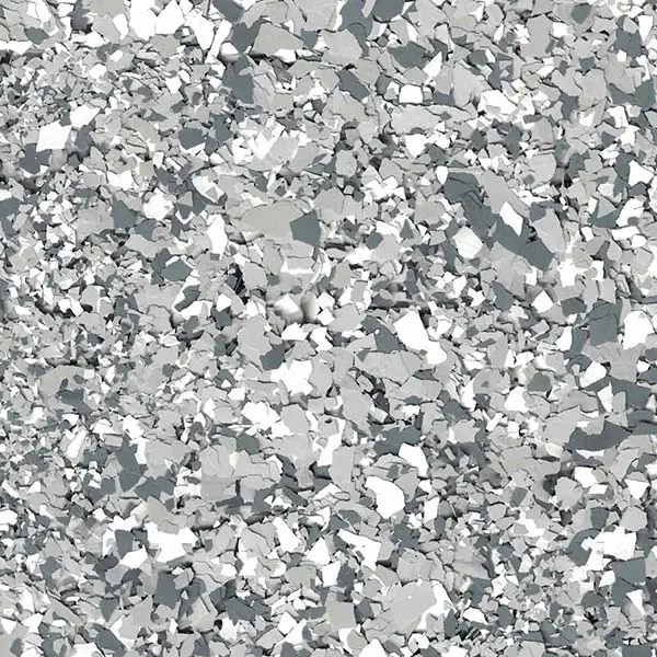 The image shows a chaotic pattern of black and white shapes resembling fragmented pieces. It's an abstract visual without discernible figures or objects.